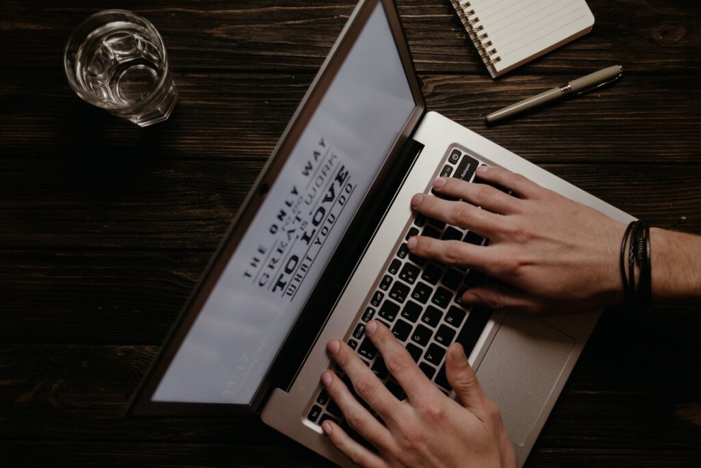 Writing content on a laptop at a calm workspace