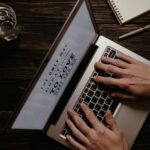 Content Marketing & Management Writing content on a laptop at a calm workspace