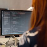 WordPress Website Development A developer working on website code in a bright office