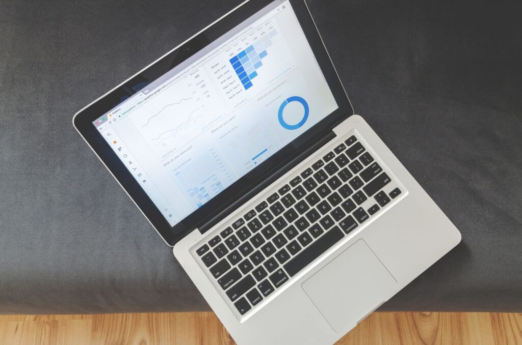A laptop showing marketing performance charts